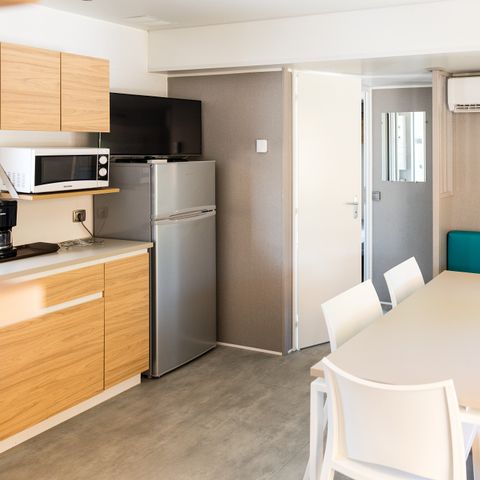 Mobilheim 4 Personen - Premium | 2 Zi. | 4 Pers. | Einfache Terrasse | Klimaanlage | TV