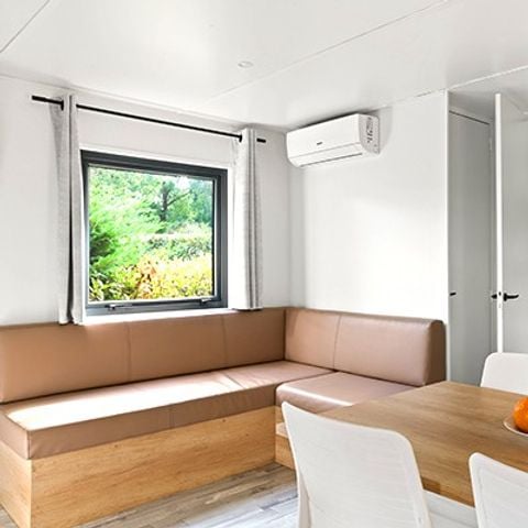 Mobilheim 4 Personen - Ultimate | 2 Zi. | 4 Pers. | Einfache Terrasse | Klima | TV